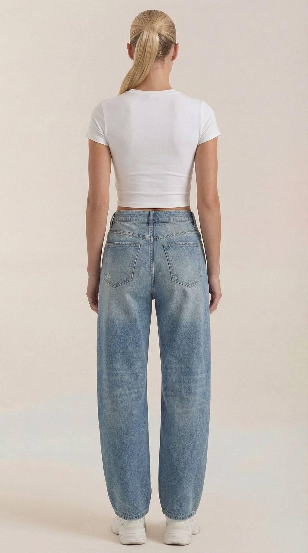 Light blue wide-leg jeans, back view with button-back yoke and two pockets