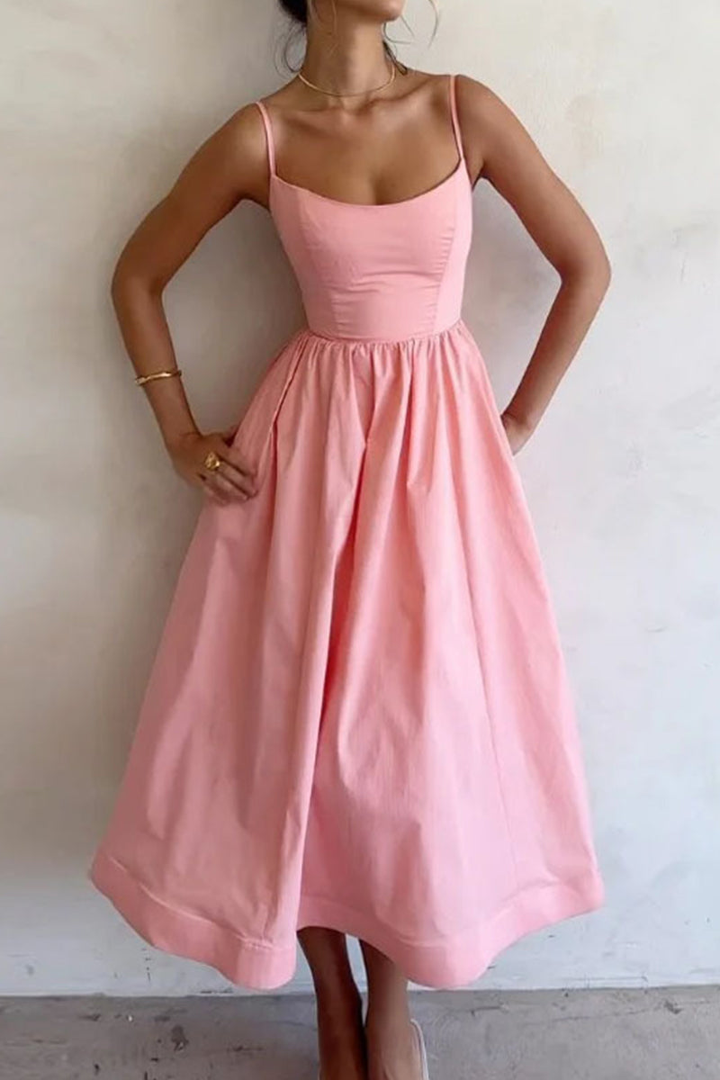 Pink midi dress with thin straps, fitted bodice, and gathered skirt at waist