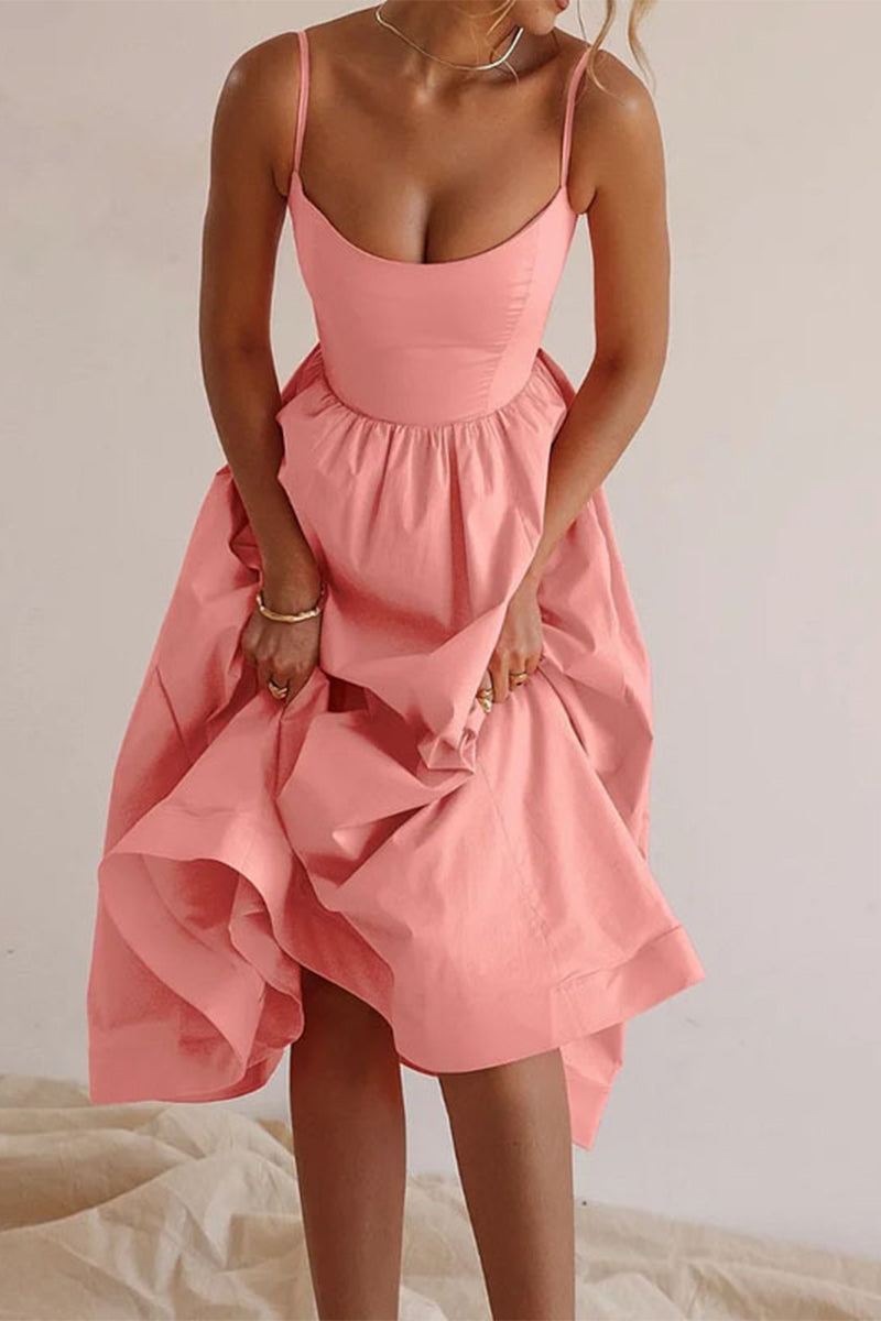 Pink midi dress with thin straps, gathered waist, and layered skirt with ruffles