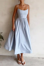 Light blue midi fit-and-flare dress with spaghetti straps and gathered skirt