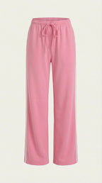 Women's pink wide-leg track pants with elastic drawstring waist and side stripes.