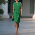 Green sleeveless midi sheath dress with ruched waist and keyhole neckline