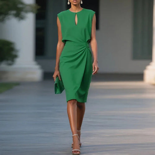 Green sleeveless midi sheath dress with ruched waist and keyhole neckline