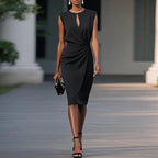 Black sleeveless ruched midi sheath dress with keyhole neckline
