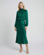 Dark green satin cowl neck midi dress with long puff sleeves and midi length hem