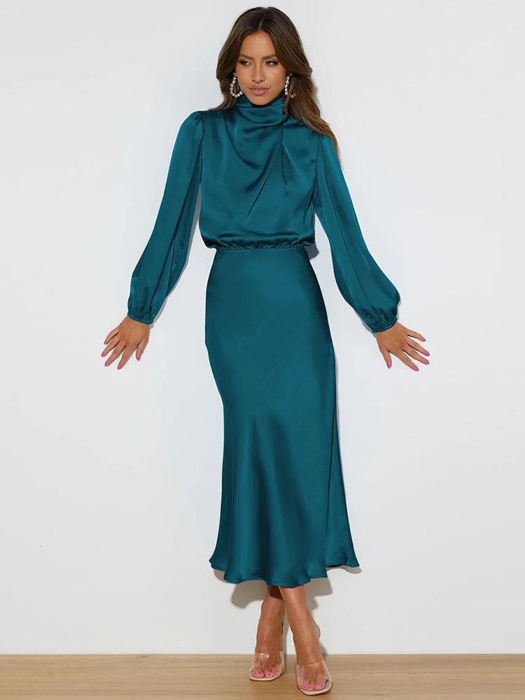Teal satin cowl neck midi dress with long sleeves and tapered waist