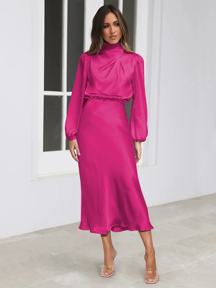 Pink satin cowl neck midi dress with long sleeves and cinched waist