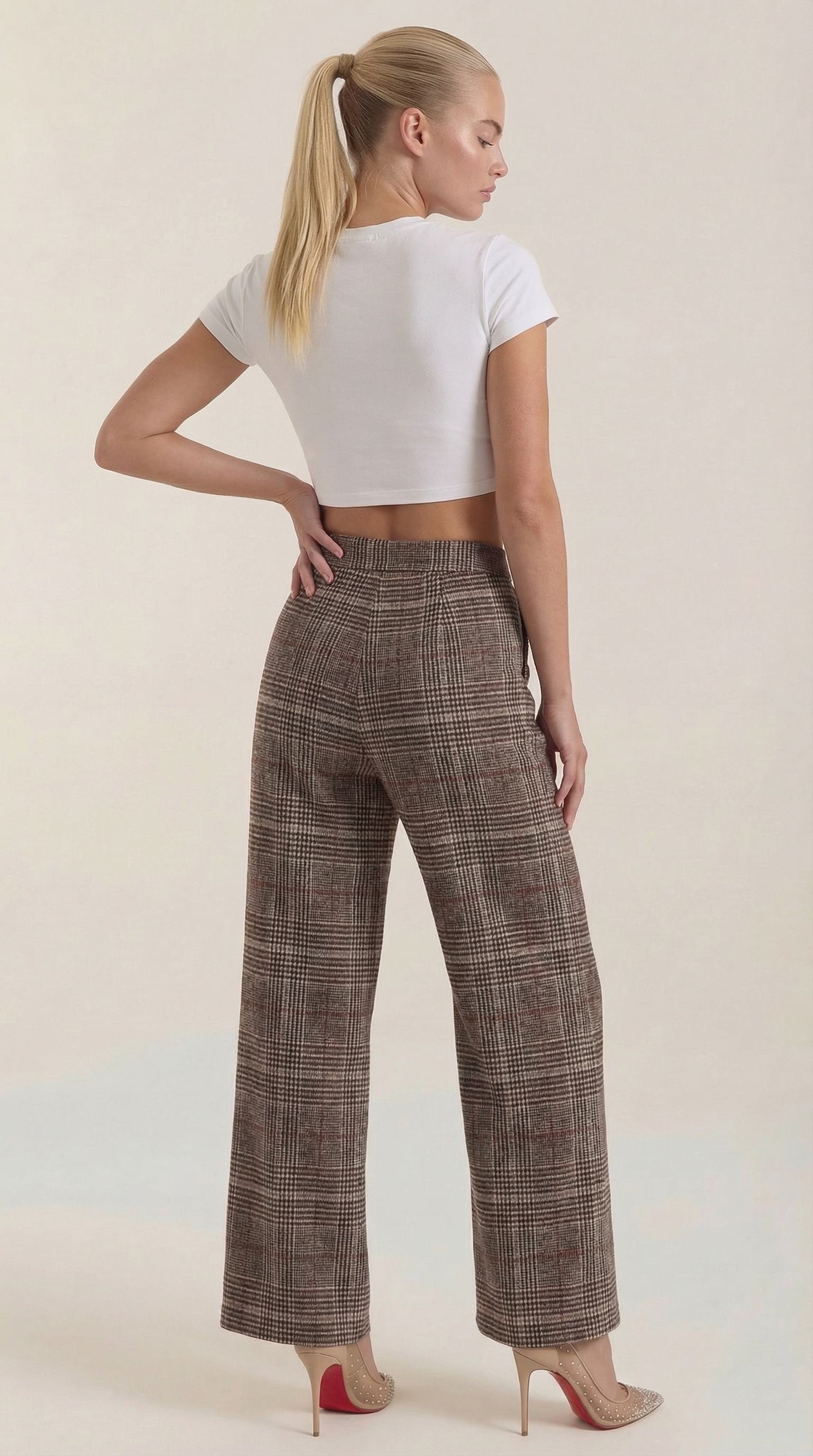 Women's brown plaid high-waisted wide-leg trousers, back view