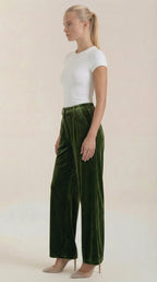 Green velvet wide-leg pants with relaxed fit and elastic waistband