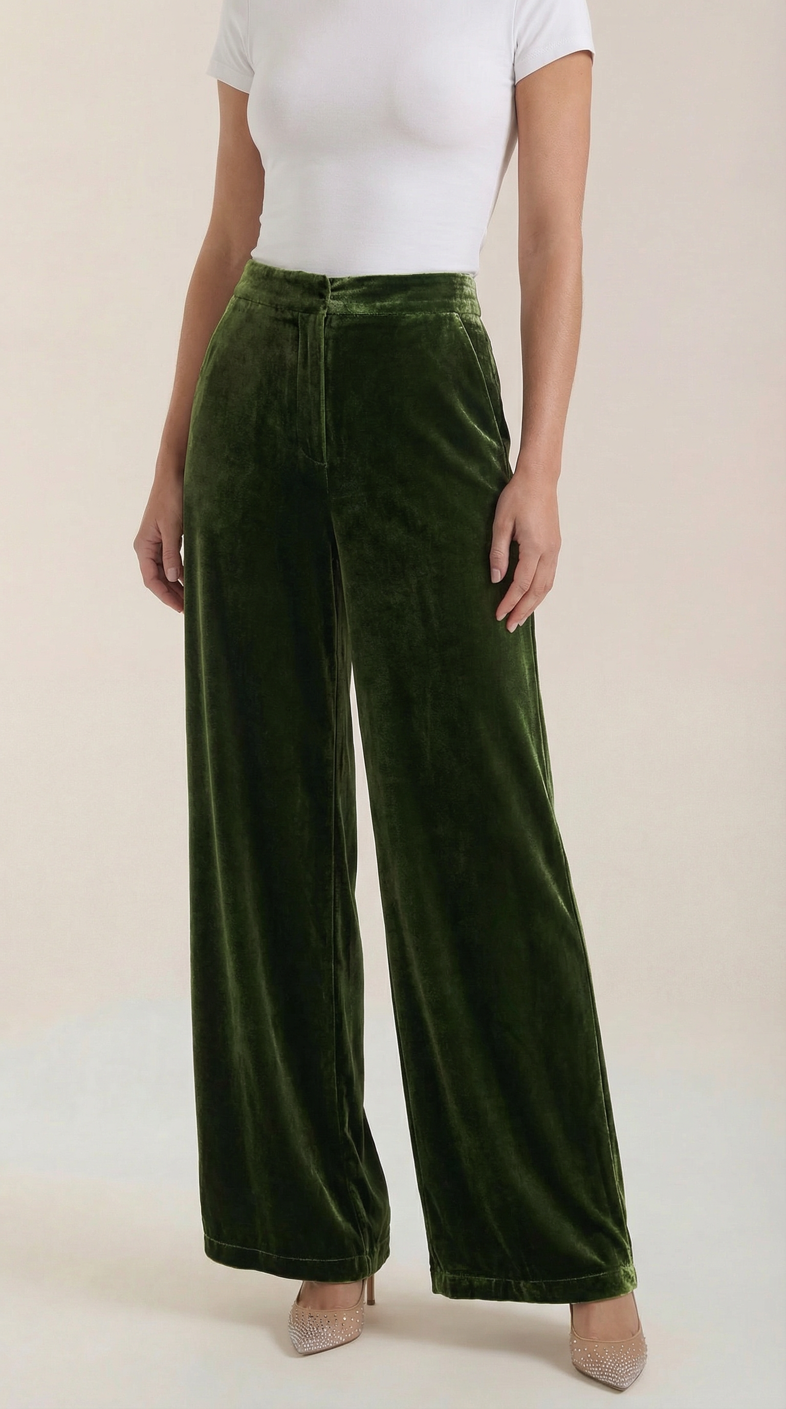 Green velvet wide-leg pants with high waist and flowing straight legs