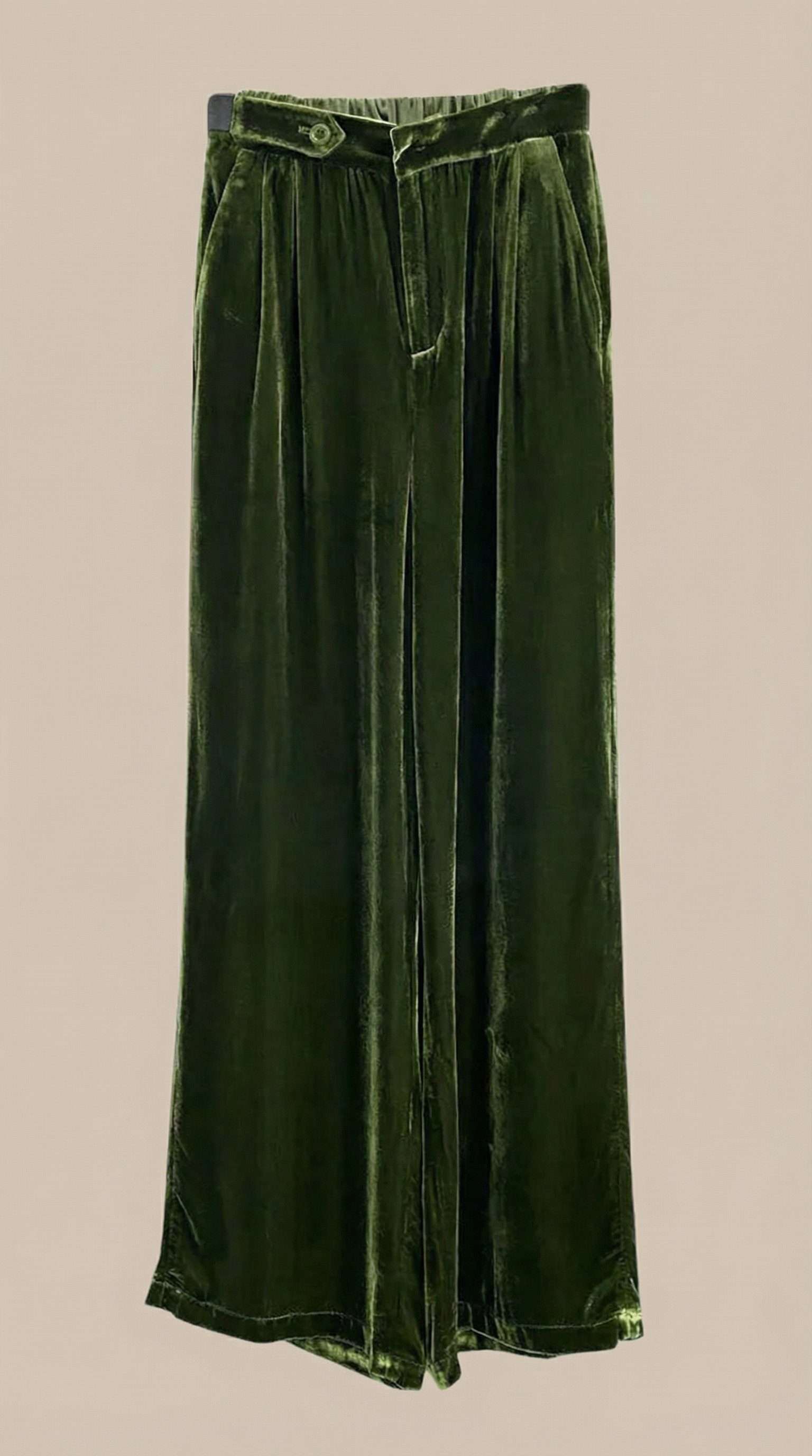Green velvet wide-leg pants close-up with button front and pleated waist