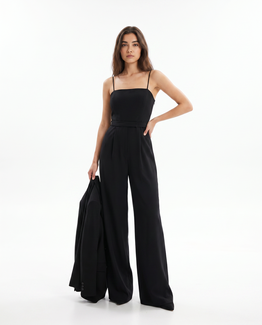 Women's black strappy wide-leg jumpsuit with cinched waist and flowing wide legs