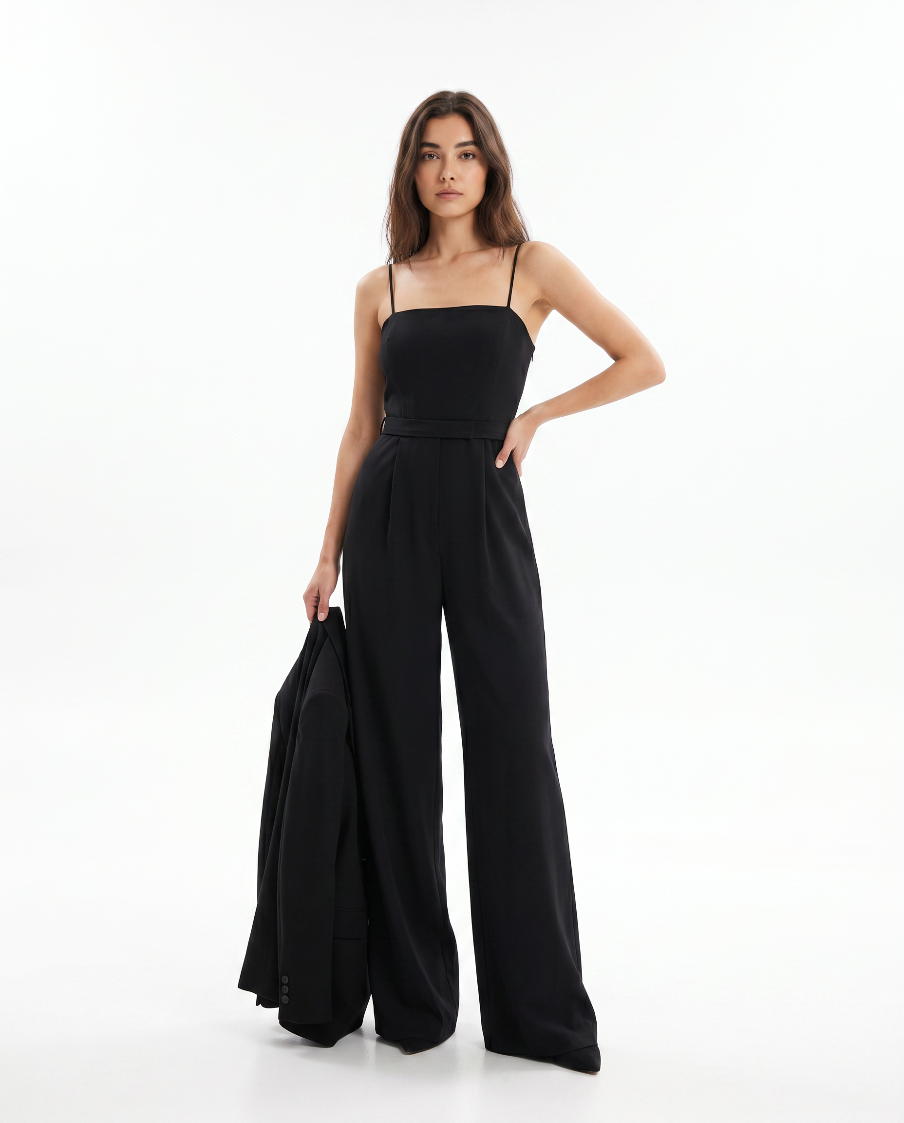 Women's black strappy wide-leg jumpsuit with cinched waist and flowing wide legs