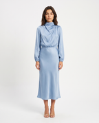 Light blue satin cowl neck midi dress with long sleeves and fitted waist