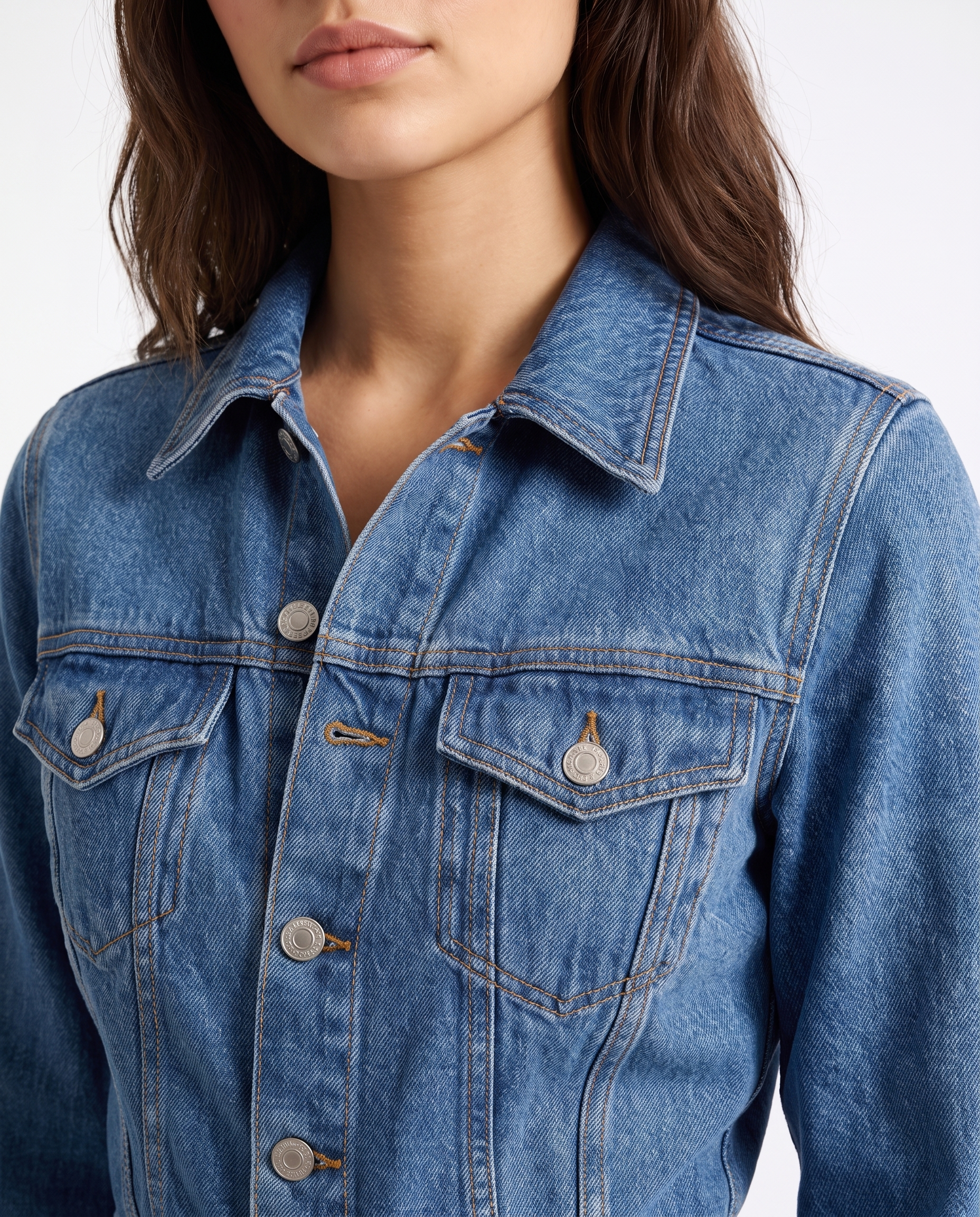 Blue denim jumpsuit top with collared neckline, button placket, chest flap pockets