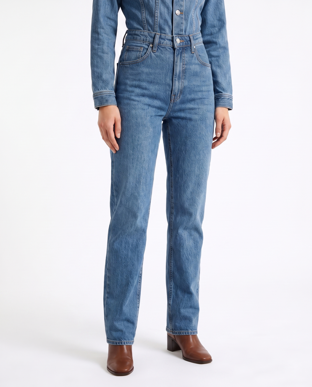 Blue denim jumpsuit with belted waist and straight-leg pants, front view