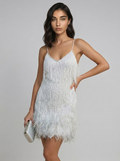 Women's white sequin mini dress with feather fringe hem, spaghetti straps