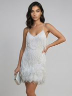 Women's white sequin mini dress with feather fringe hem, spaghetti straps