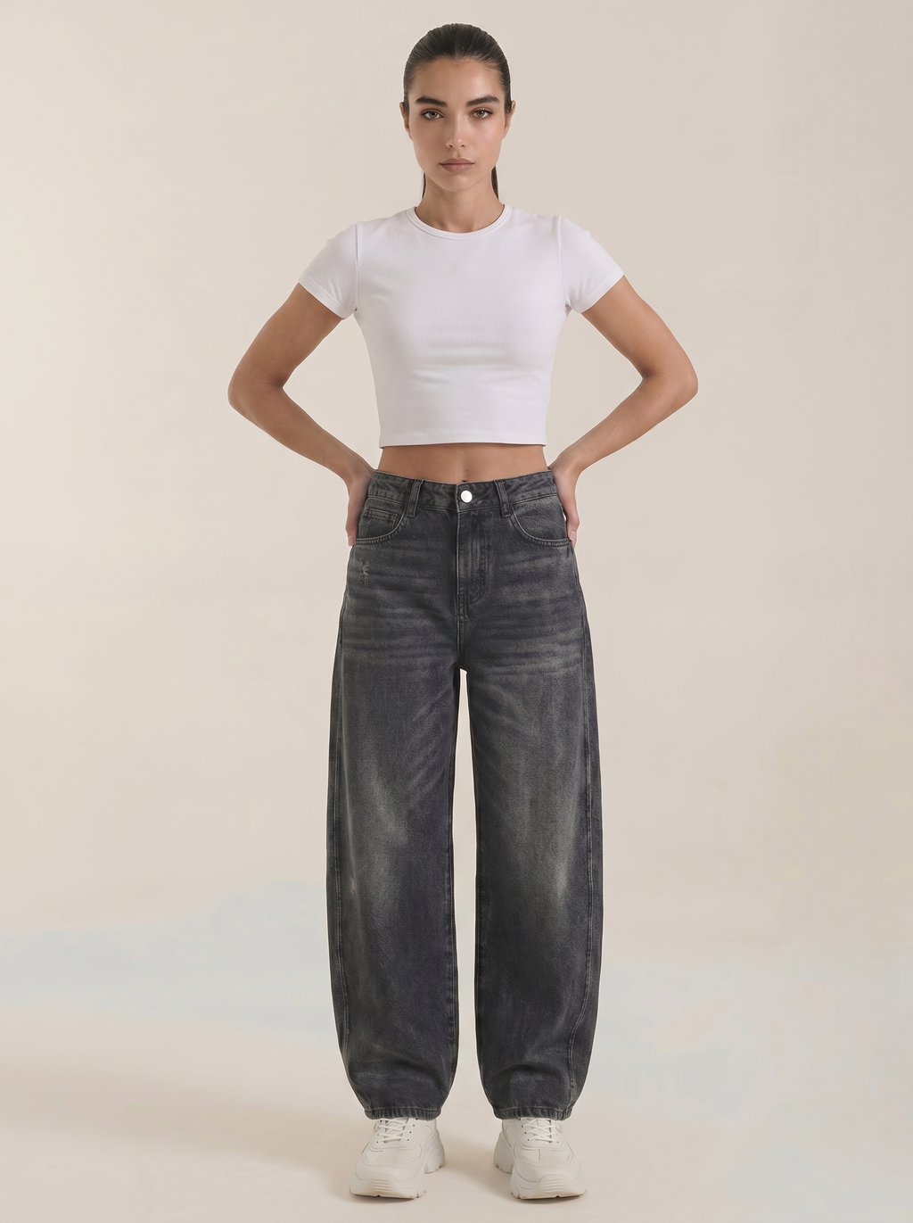Dark gray wide-leg jeans, high-rise waist, button-front closure and relaxed fit