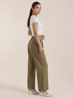 Women’s dark green high-rise pleated wide-leg pants, side view with belt loops.