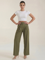 Women’s dark green high-rise pleated wide-leg pants, front view with seam details.