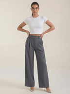 Women’s high-rise pleated wide-leg pants in gray, full length, zip front.