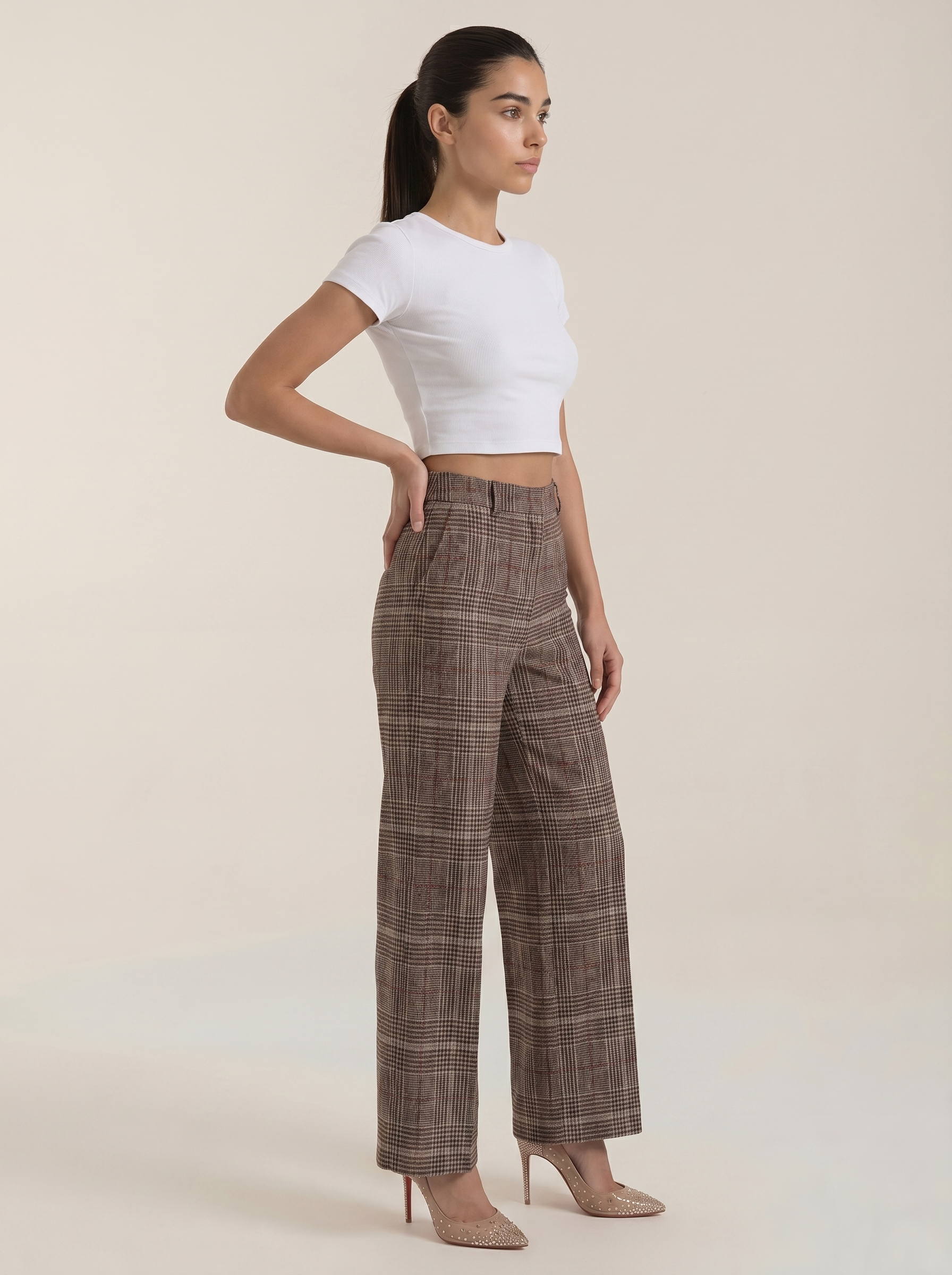 Women's brown plaid high-waisted wide-leg trousers, side view, ankle-length