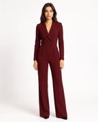 Deep red V-neck tailored blazer jumpsuit with belt, wide-leg trousers